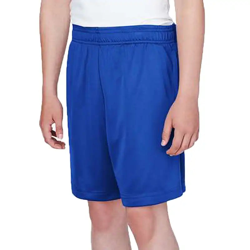 Blue shorts worn by a person on a white background