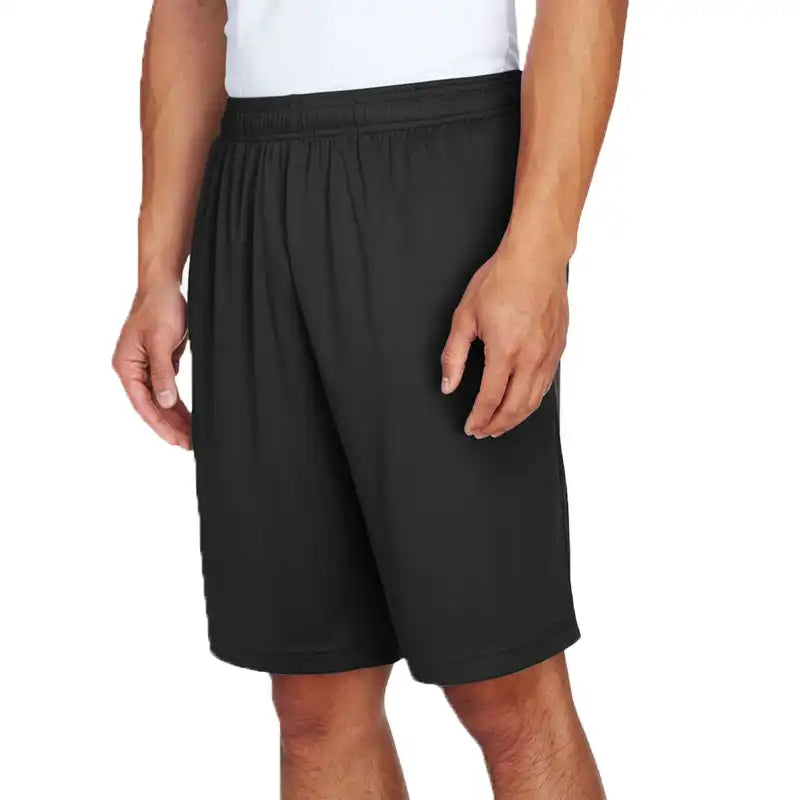 Person wearing black shorts on a white background