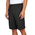 Person wearing black shorts on a white background