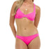 Woman wearing a bright pink bikini