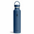 A matte blue Hydro Flask water bottle with a matching blue loop handle and a silver band near the lid