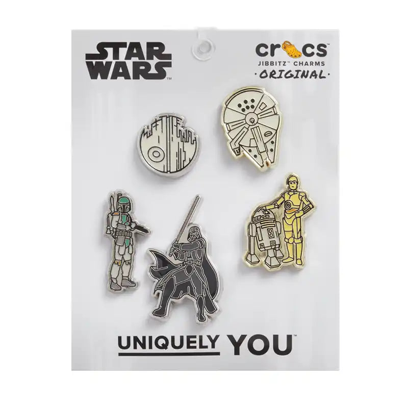 Set of Star Wars-themed charms on a Crocs branded card.