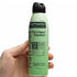 Hand holding a can of Natrapel Tick & Insect Repellent