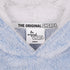 The Sherpa Plush fleece Hoodie lose up of tag detail