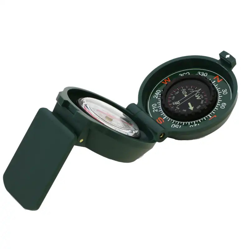 A dark green military-style compass with a hinged cover, shown open
